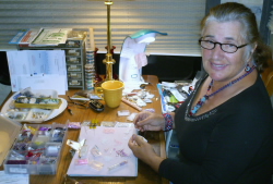 Myra Erickson enjoying what she does best in her home workshop